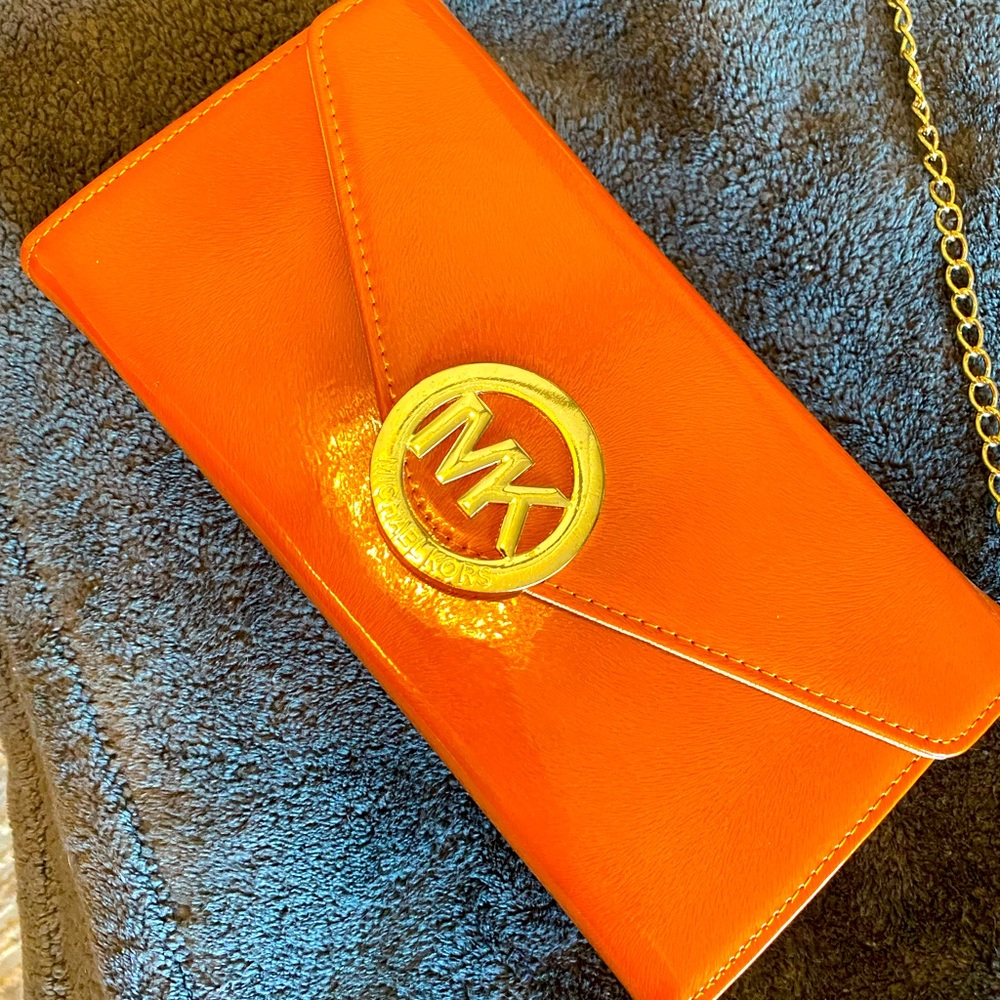 Beautiful orange Michael Kors crossbody purse